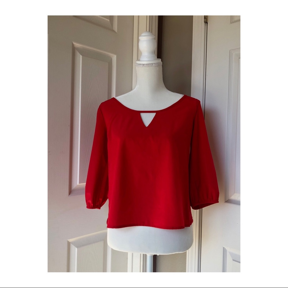 Red 3/4 sleeve red blouse with tulip hem back
